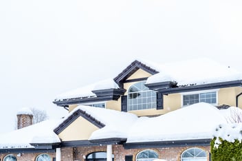 A New England roof covered in snow
